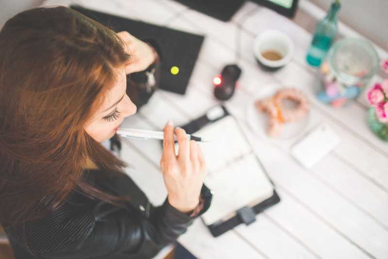 Woman with pen