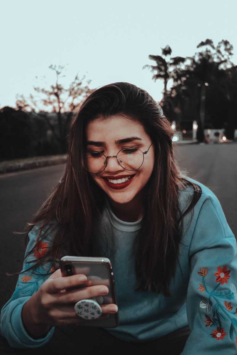 Woman looking at smartphone