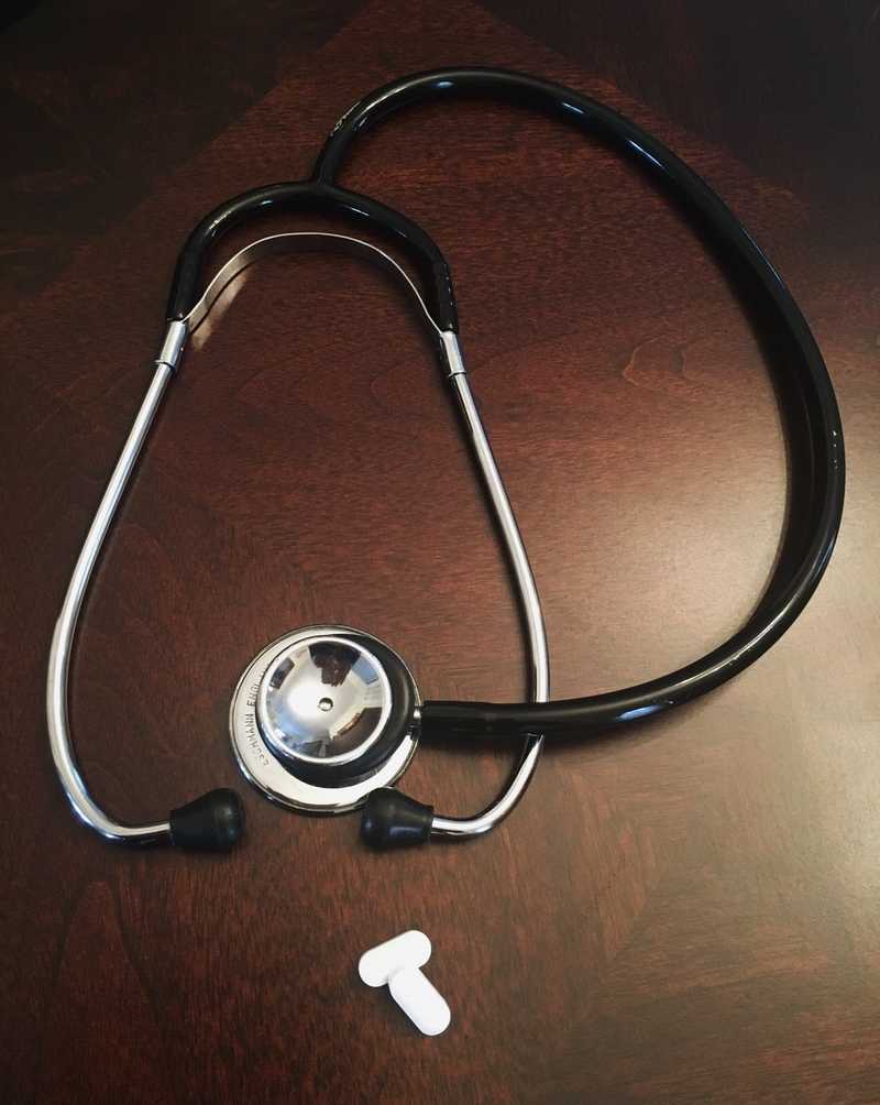 Stethoscope and pills